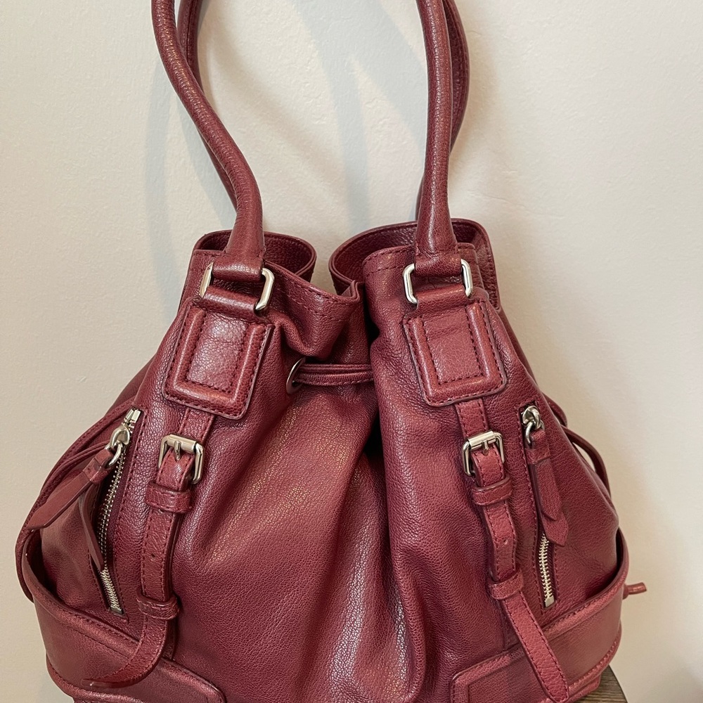 Cognac colored Coke Han leather bag.  Gently used, and in beautiful condition.